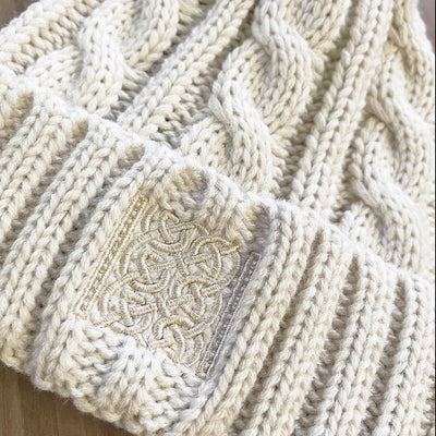 Book of Kells Cable Knit Bobble Hat in Beige