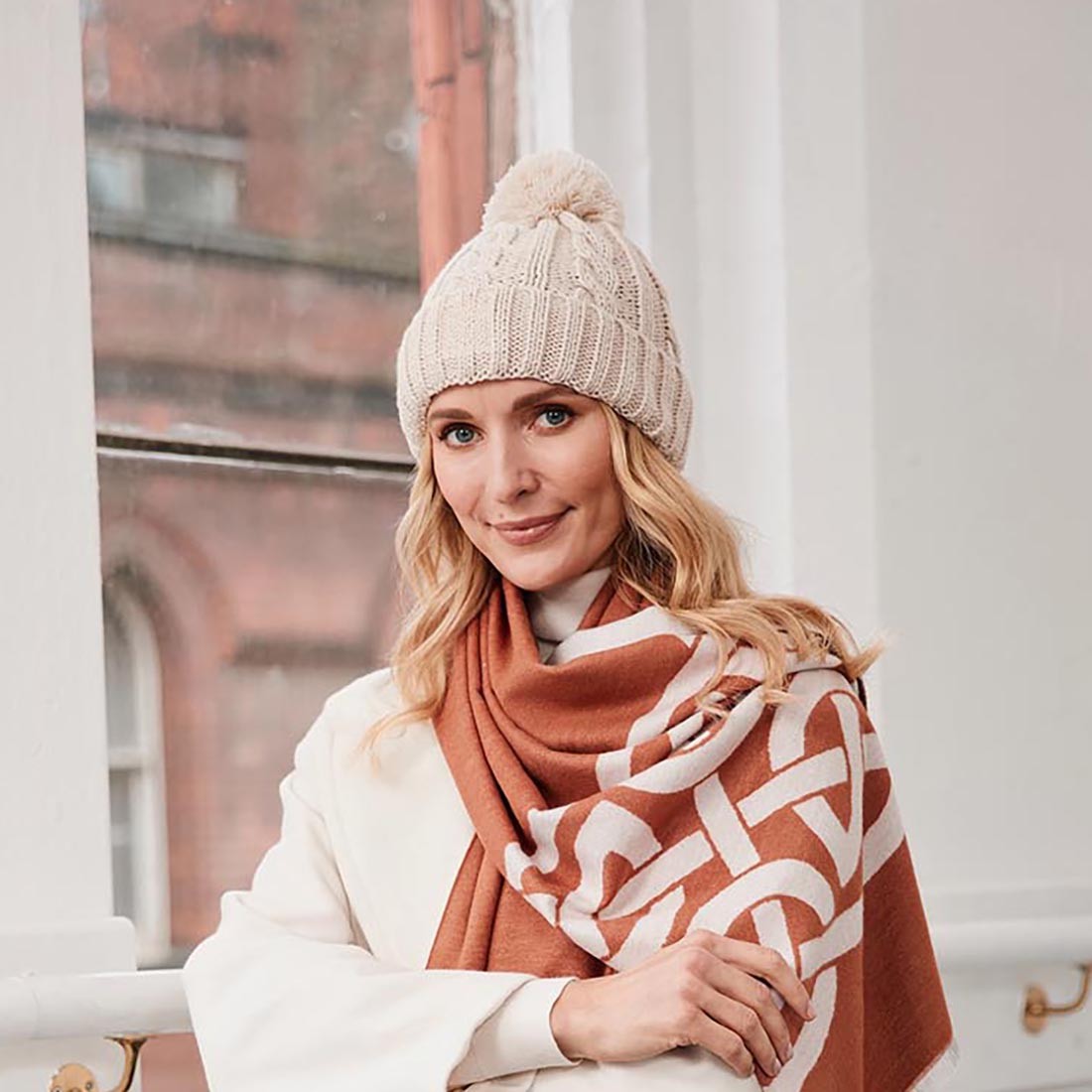 Book of Kells Cable Knit Bobble Hat in Beige