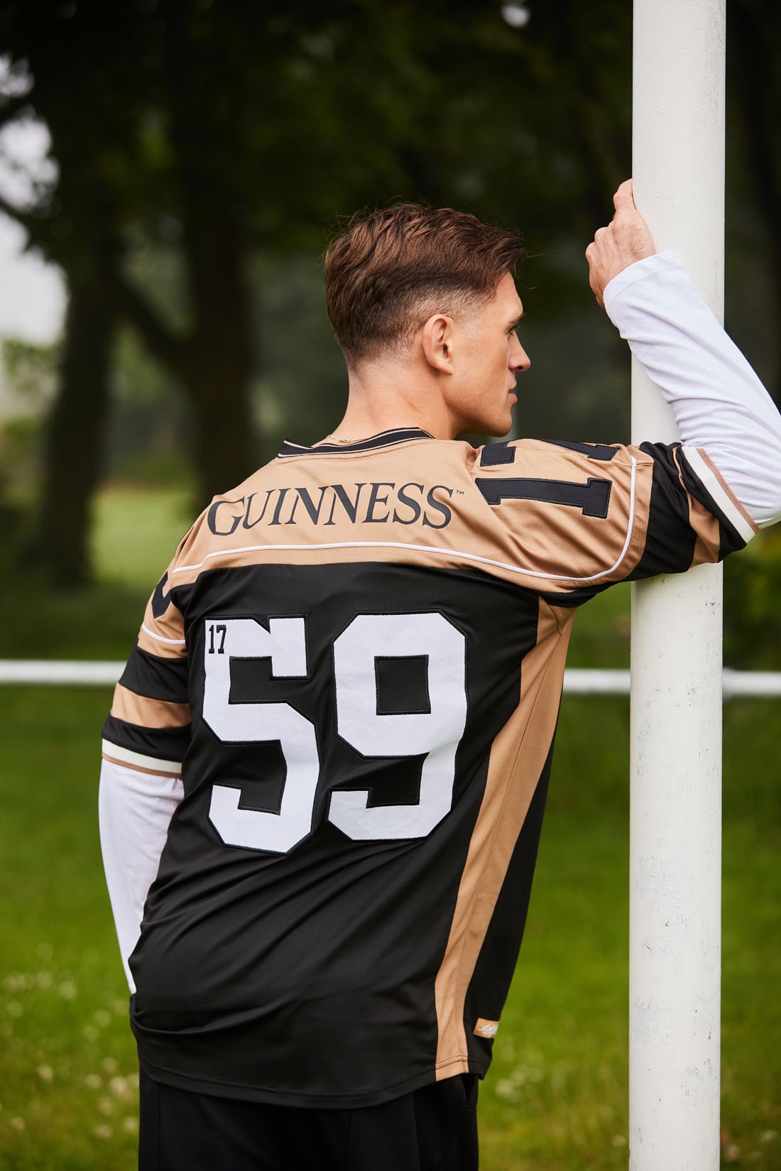 Guinness American Football Top in Black & Gold