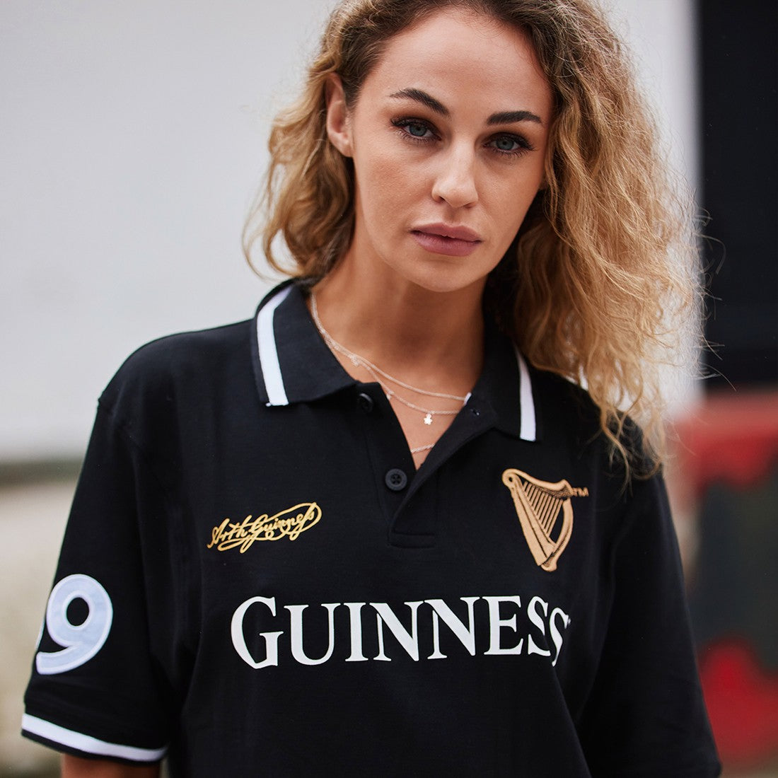 Guinness 59 White Stripe Collar Short Sleeve Polo in Black