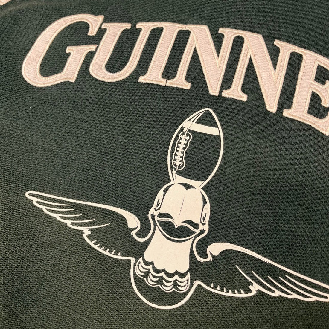 Guinness American Football Toucan Sweatshirt in Bottle Green