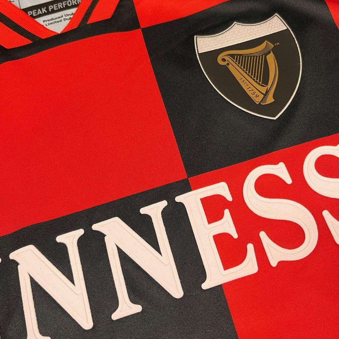 Guinness “Black & Red Check” Performance Top