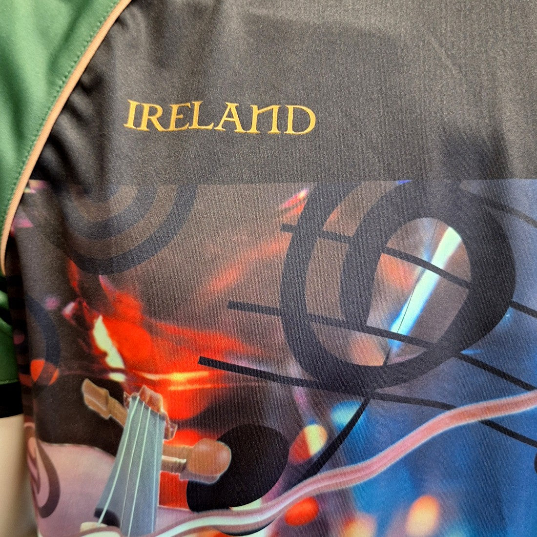 Ireland ‘Music’ Recycled Performance Top in Black & Bottle Green