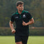 Ireland Shamrock Performance Polo Shirt in Black & Green