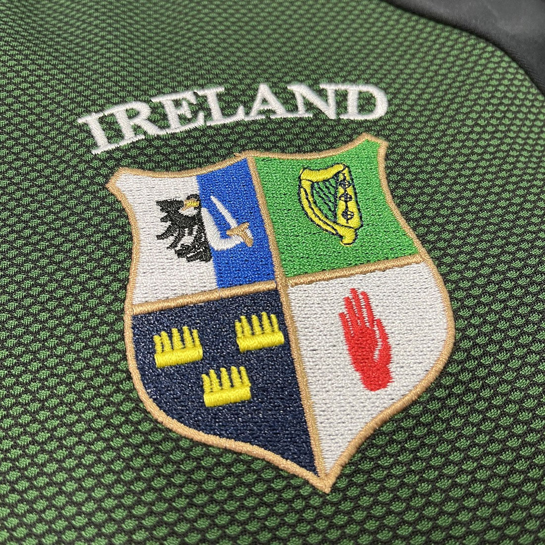 Kids Four Province's Crest Bottle Green Performance Top