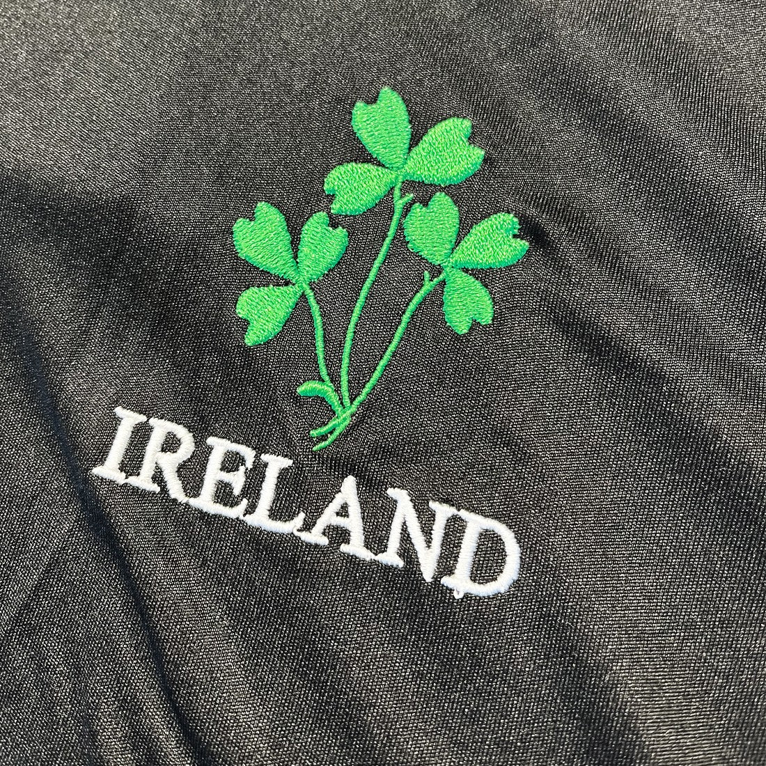 Lansdowne Ireland Performance Polo in Black & Green