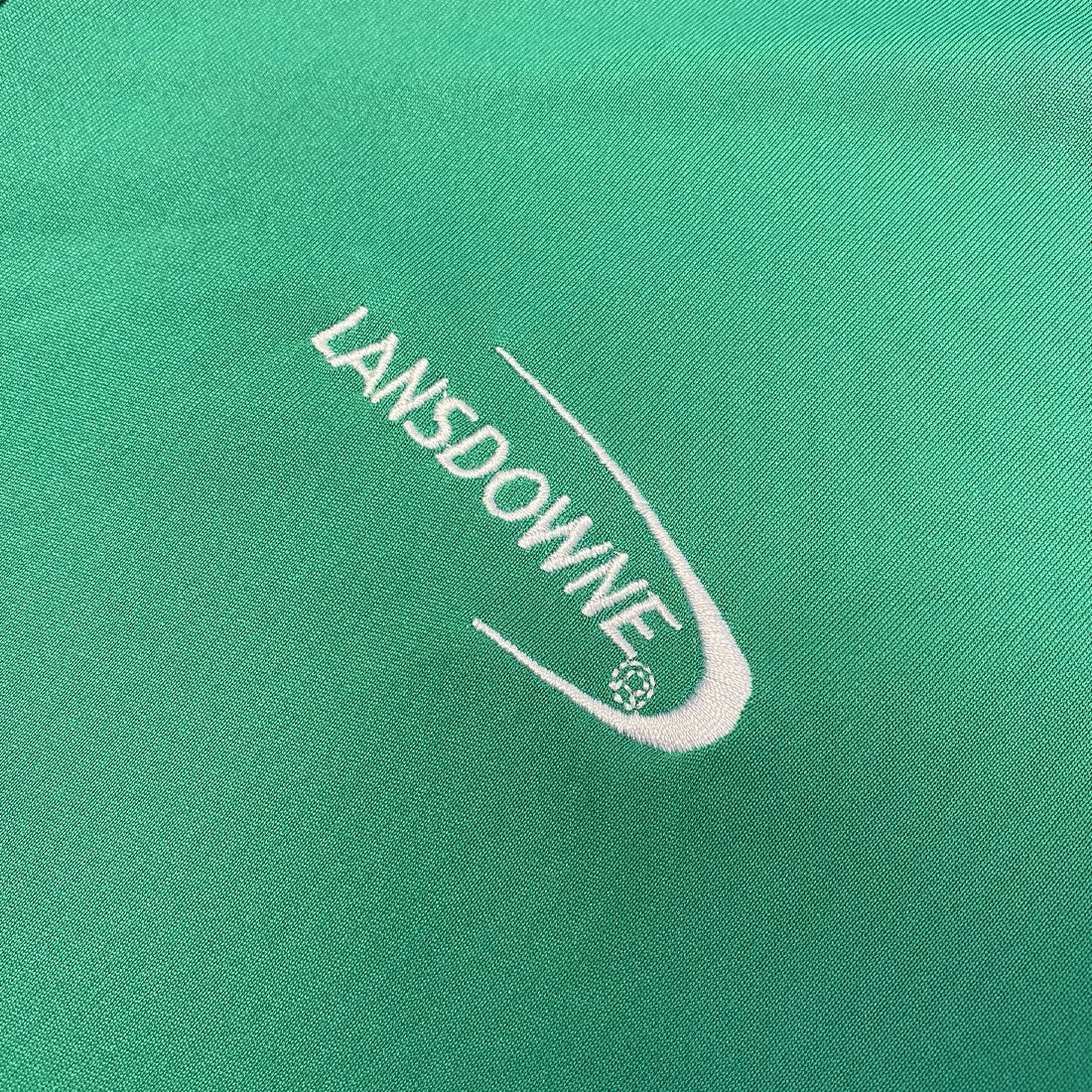 Shamrock Crest Performance Top in Island Green